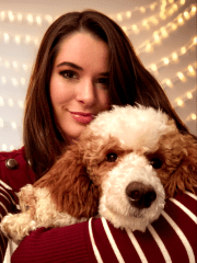 Author photo, soft smile, down hair, warm lighting, backdrop 2